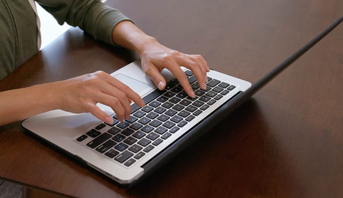 woman on computer doing security training