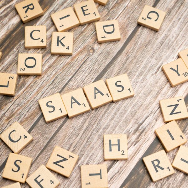 scrabble-letters-spelling-saas-on-a-wooden-tabl